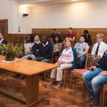 image of people sitting during drop in silence